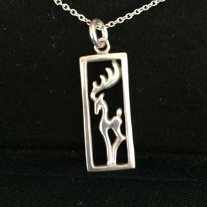 Sterling silver small deer necklace.